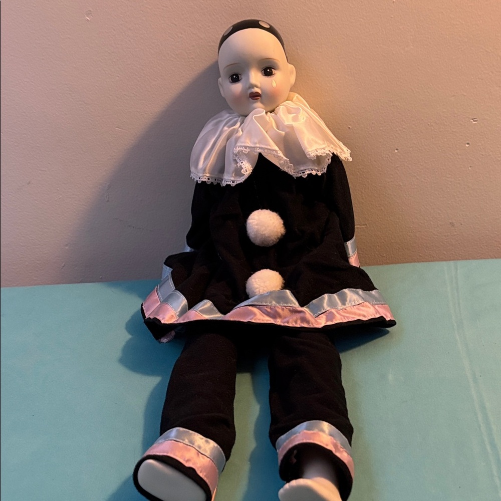 Elegant Porcelain Clown Doll in Black and Pink Attire